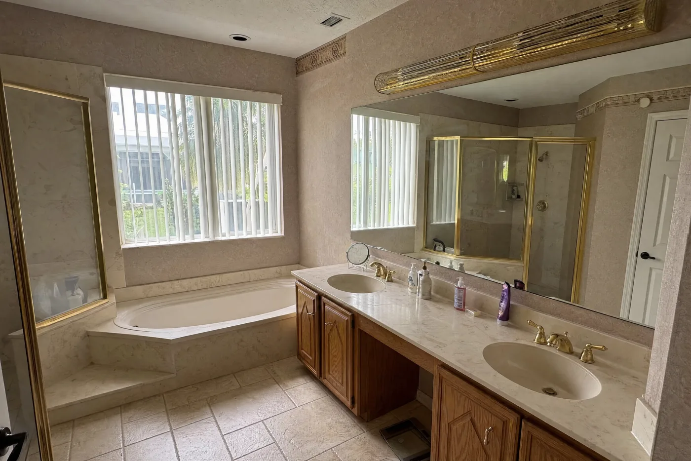 Dated master bathroom before remodel